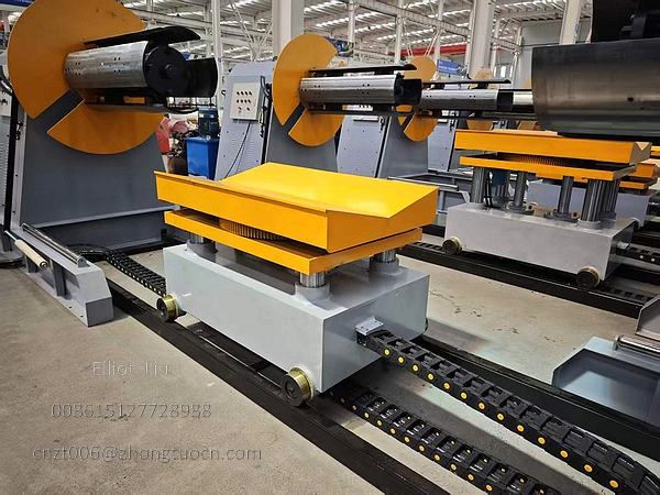 Decoiler 7 Ton 1250mm with Electrically Rotating Loading Cart 11 The loading trolley serves the two unwinding machines.