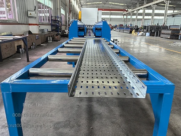 Finished cable trays on collection table Finished cable trays on collection table